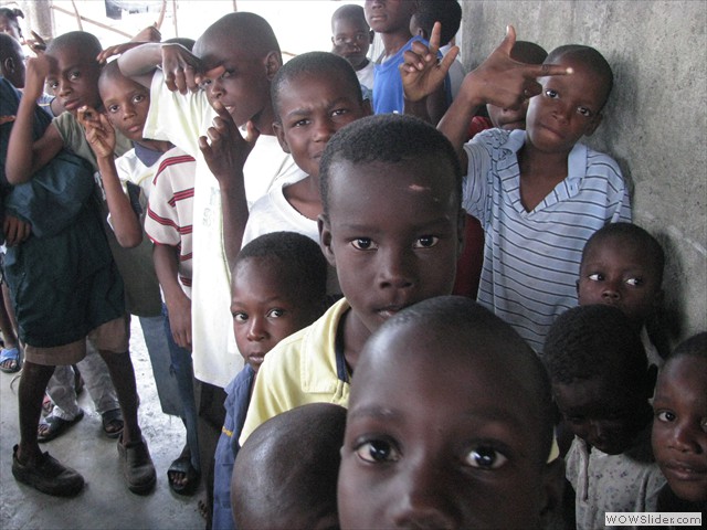 boys lining up for food boys lining up for food